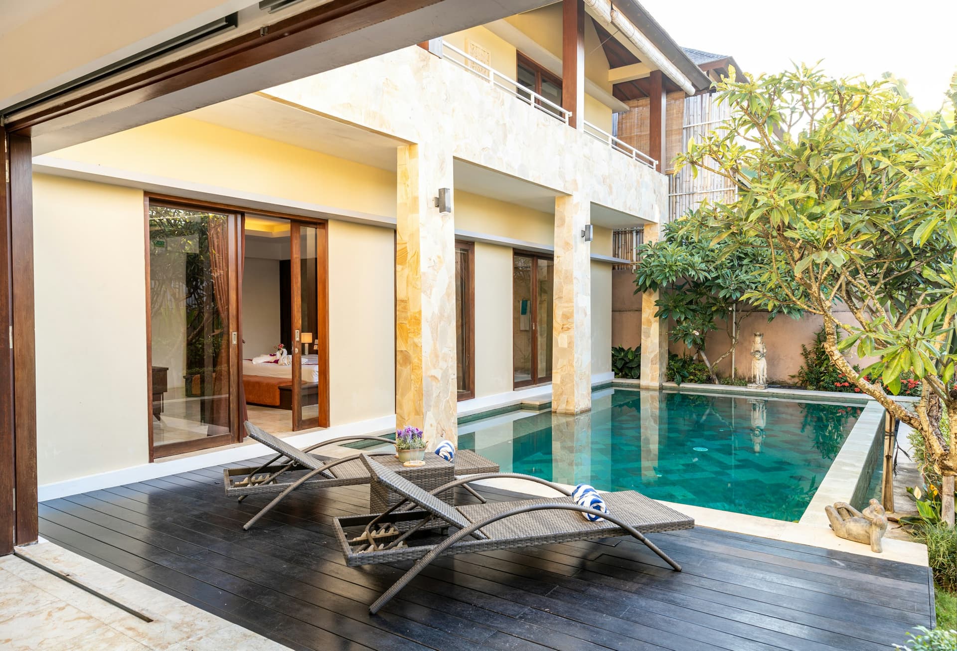 Sri Lanka coastline at golden hour — three villa silhouettes